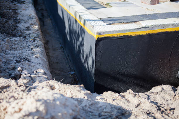 Professional Waterproofing technician working in South River, NJ